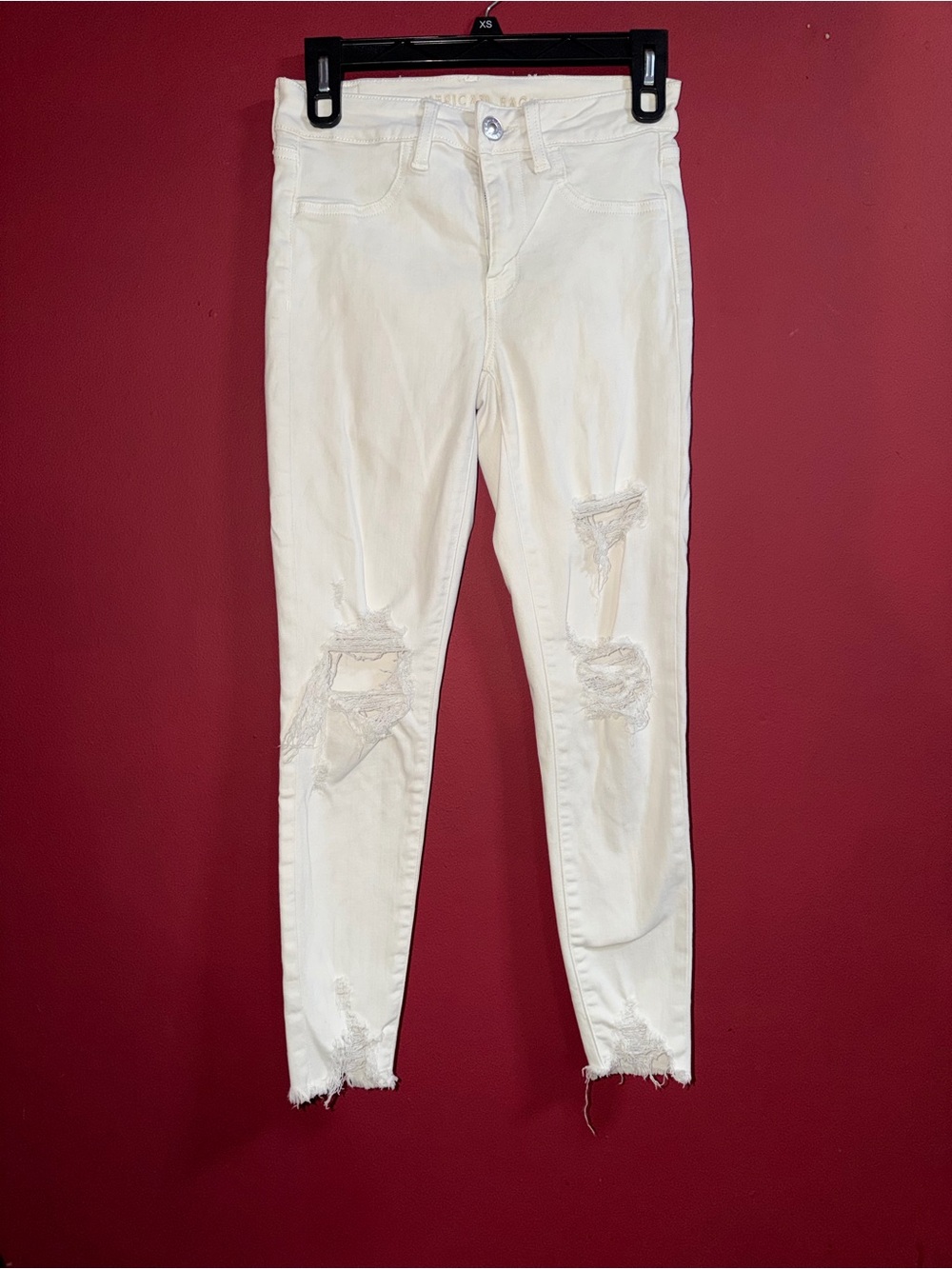 American Eagle Outfitters Cream Distressed Skinny Jeans